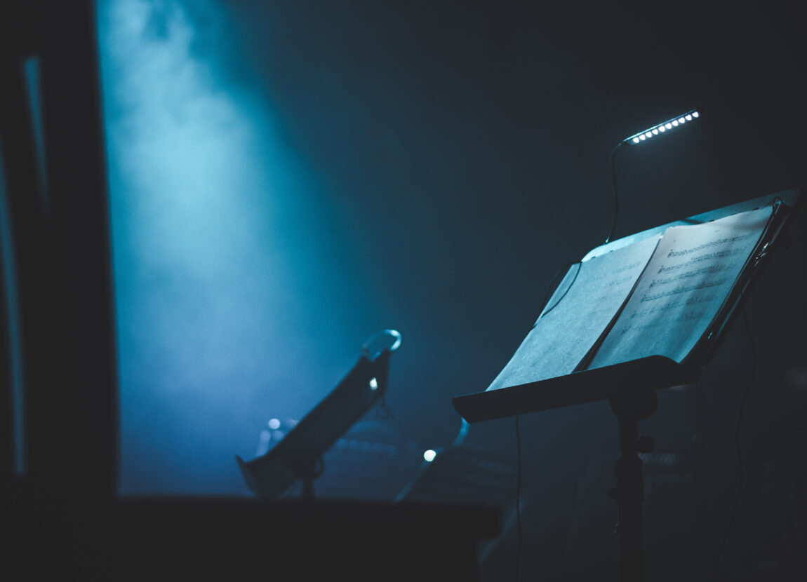 picture of music sheet on stand blue background