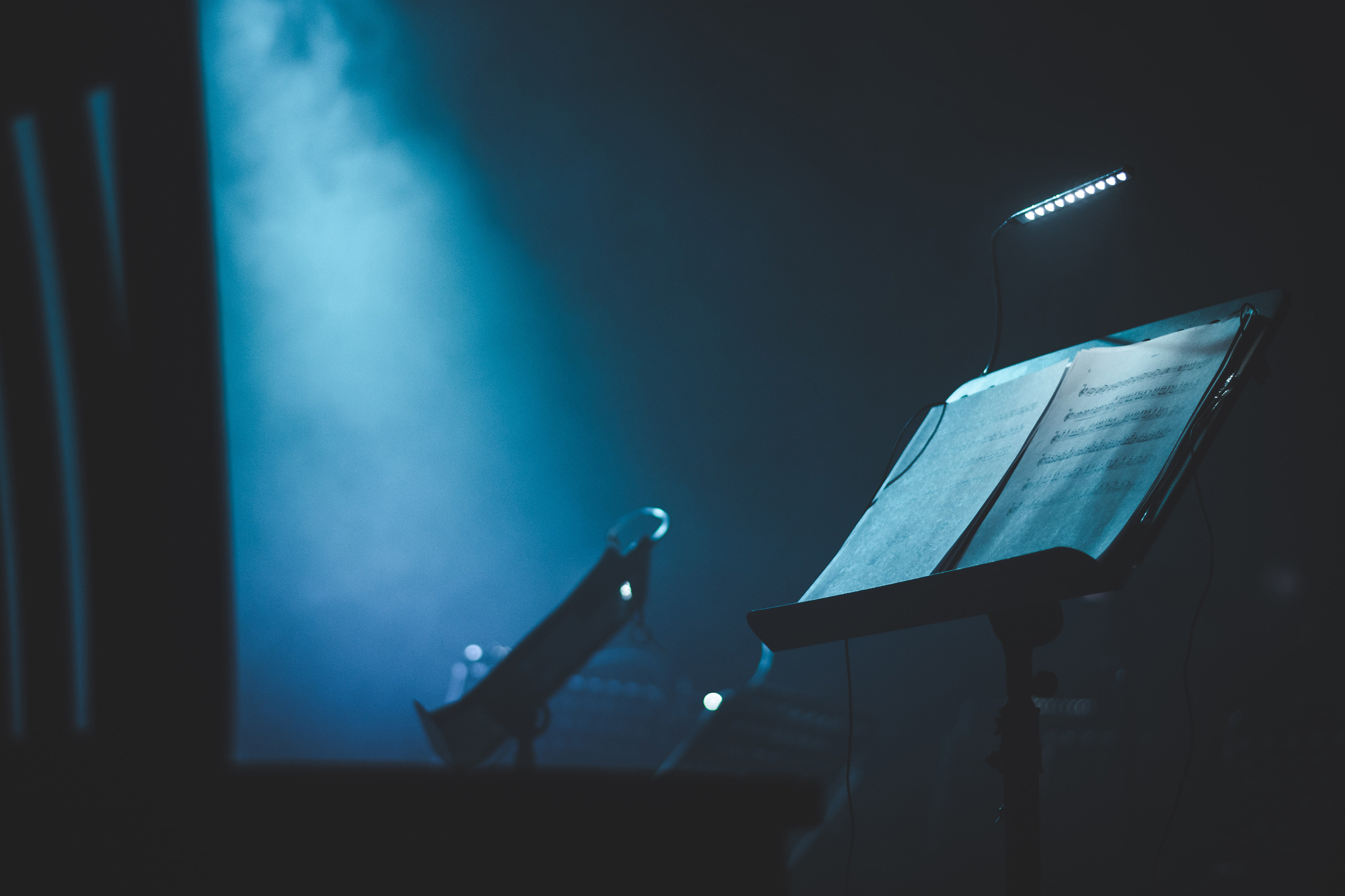 picture of music sheet on stand blue background